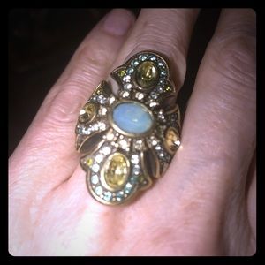 Ring. Big greens and aquamarine colors.
